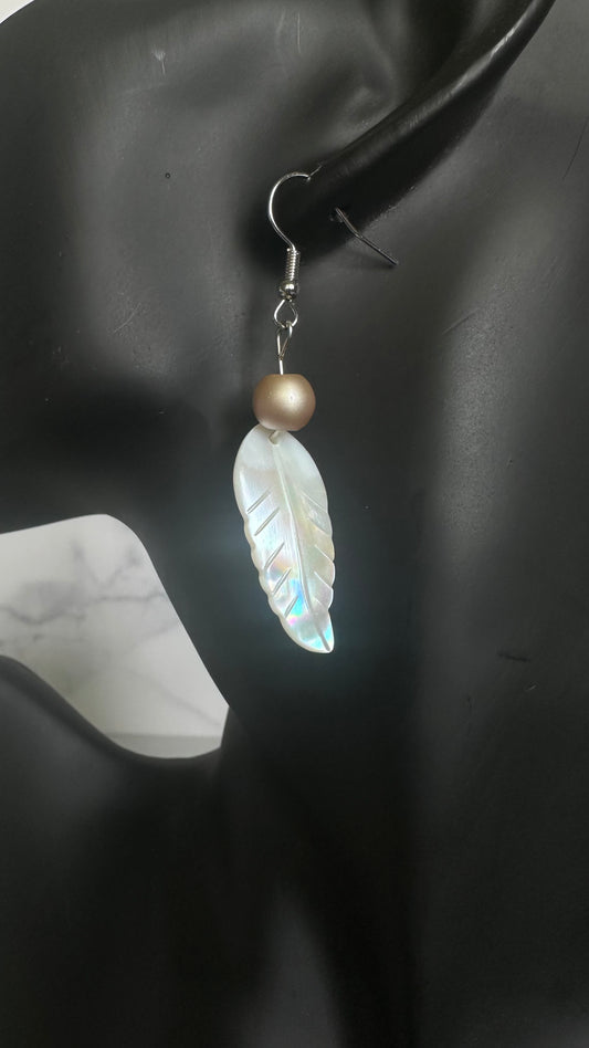 Pearlescent white feather earrings